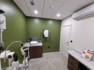 office with two green feature walls scaled
