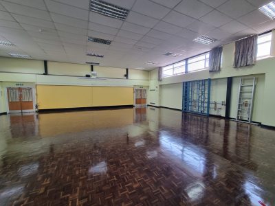 painted walls of a school sports hall scaled