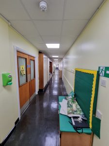 the painted hallway of a school corridor decorated by mc painters scaled